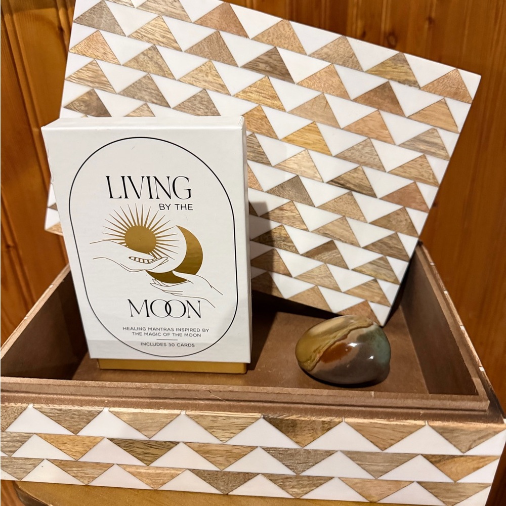 Living by the Moon Coffee Table Book with Gold and White Accents